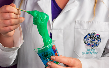Mad Scientist stretching green slime.